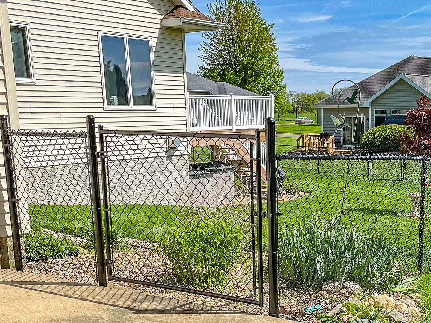 Residential 4' black chain link fence in Cedar Falls Iowa